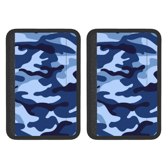 Two blue camouflage pattern seat belt cover pads with black edging and a velcro fastener.