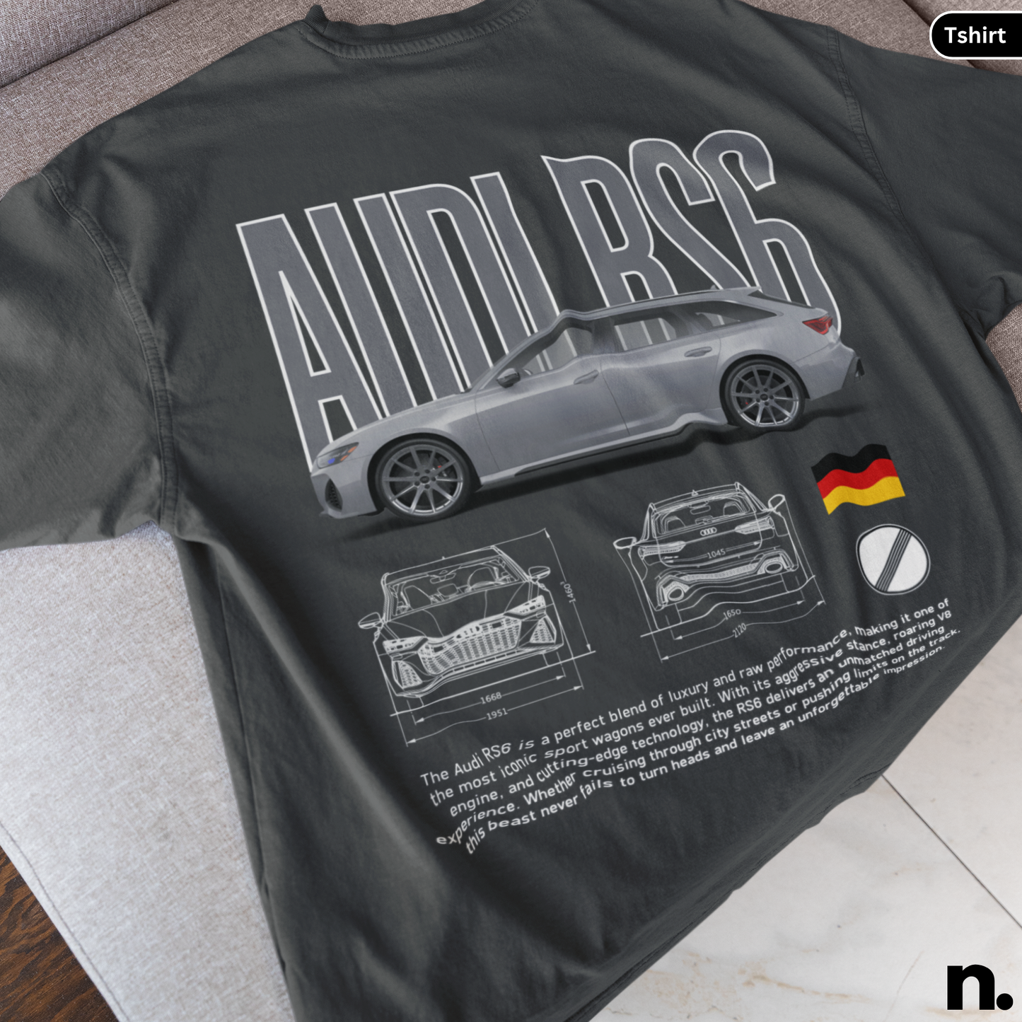 Black t-shirt with Audi RS6 design on a gray surface