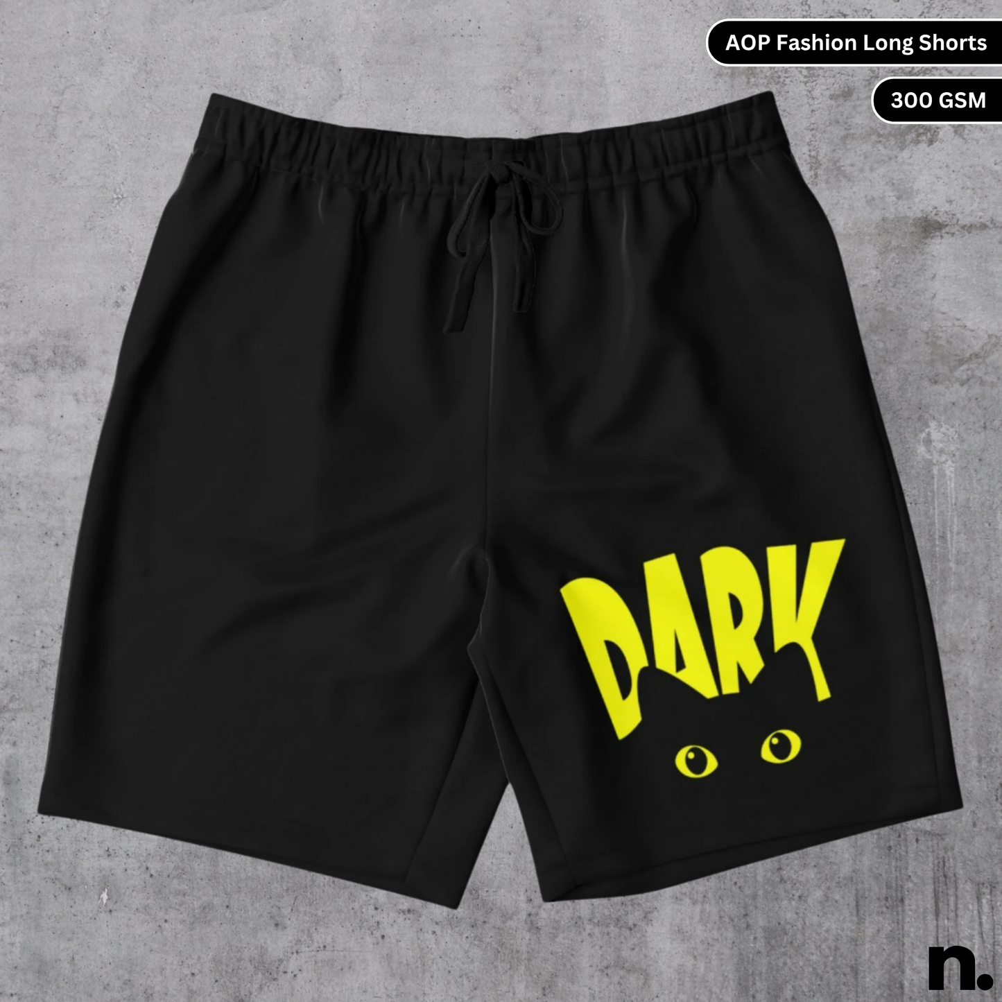 Flat lay of long shorts featuring a black cat graphic and bold "DARK" text in a mysterious streetwear design