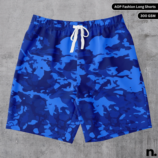 A flat lay of men's long shorts with a unique blue camouflage print, showcasing the drawstring closure and pockets.