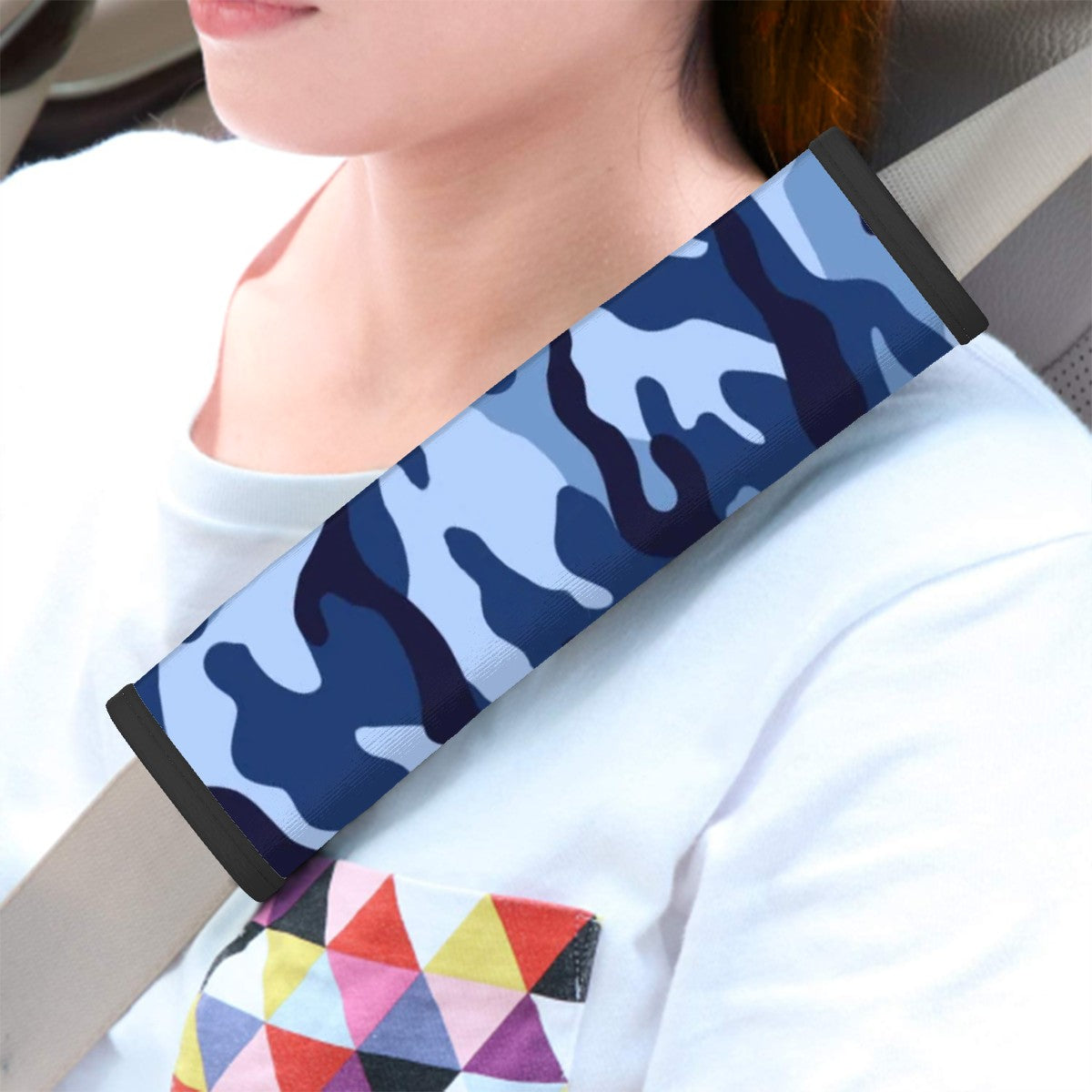 Blue camo seat belt cover pad context mockup inside car.