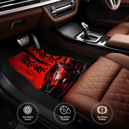 Car interior with red and black floor mat featuring a car design.