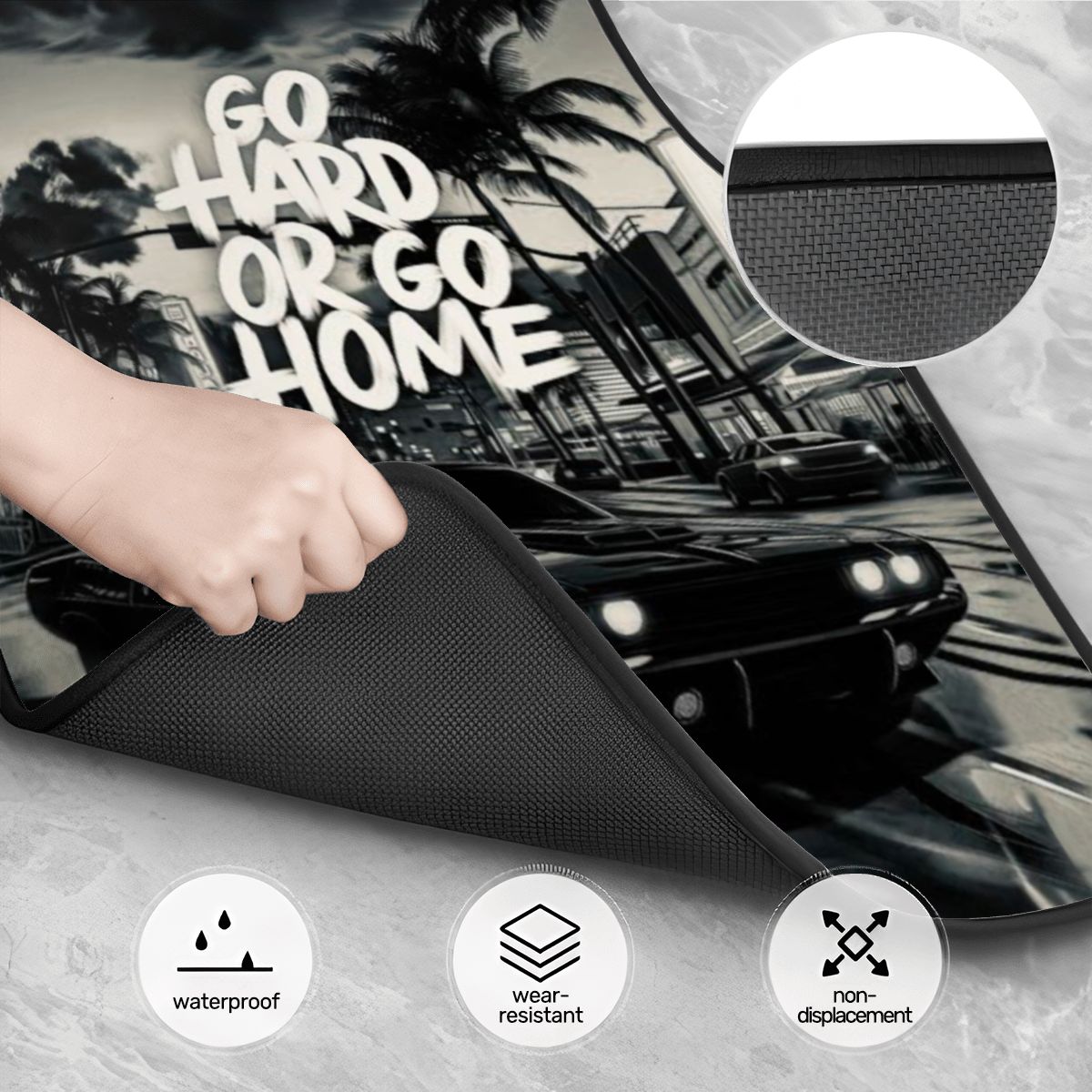Car sunshade with 'Go Hard or Go Home' text, hand holding it, car in background.