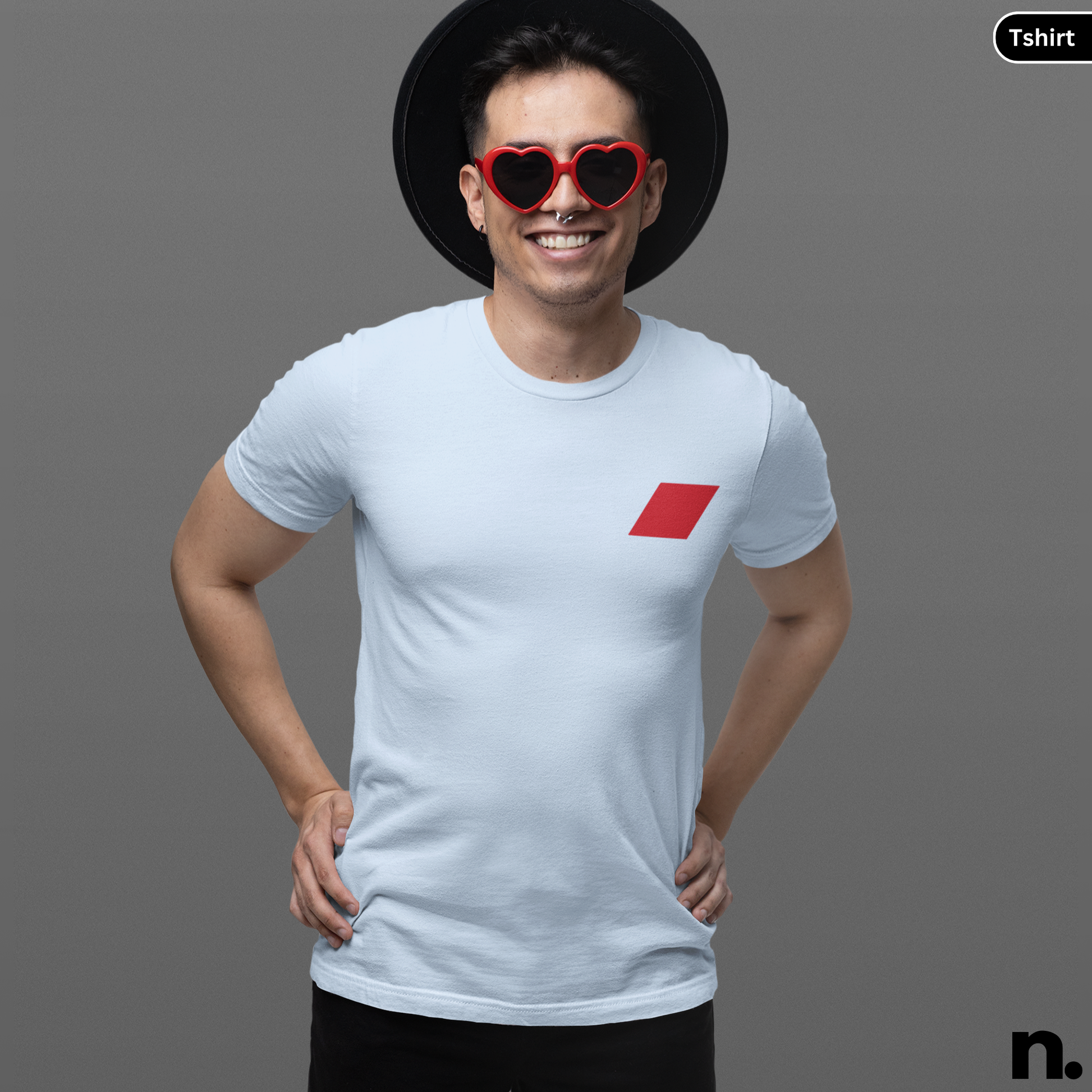 Man wearing a white t-shirt with a red square design and heart-shaped sunglasses on a gray background