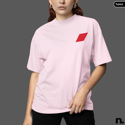 Person wearing a light pink t-shirt with a red diamond logo on a gray background
