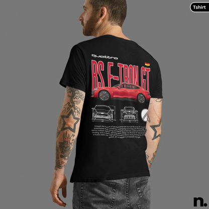 Person wearing a black t-shirt with car design and text on the back, on a gray background.