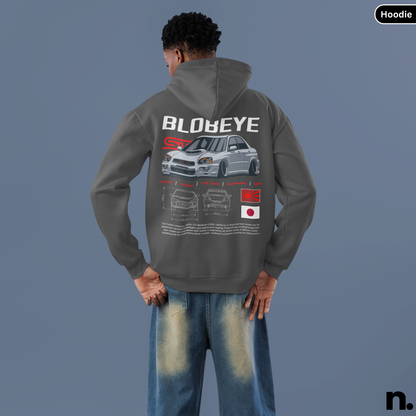 Person wearing a hoodie with 'BLOBEYE' design on the back against a blue background