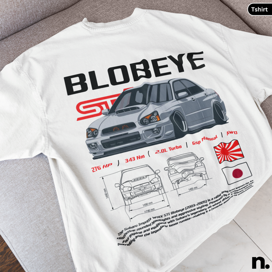 White t-shirt with car graphic and 'BLOBEYE' text on a gray surface