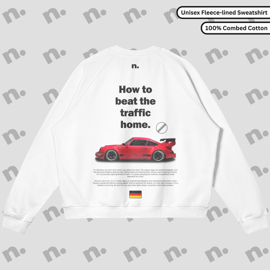 Flat lay of the 911 RWB Autobahn Sun Faded Sweatshirt showcasing an RWB Porsche design and 'How to Beat the Traffic Home' slogan.
