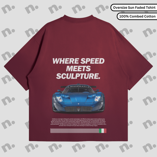 Flat lay of vintage-washed oversized tee with subtle tonal gradient and automotive-inspired graphic, featuring a boxy fit and drop shoulders.