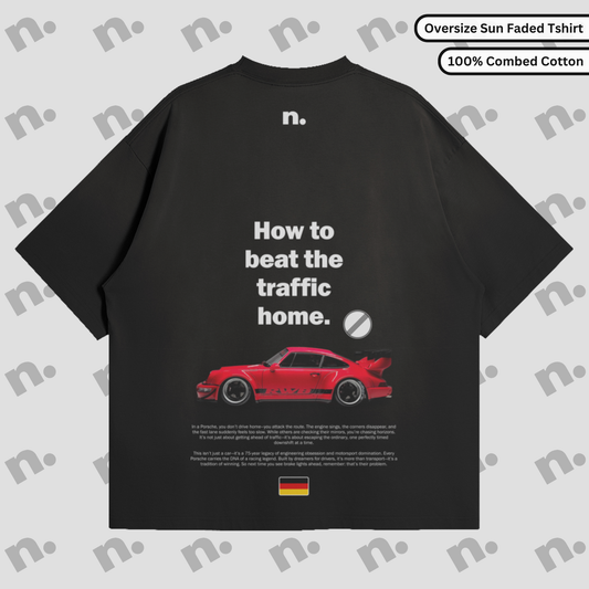 Flat lay of the 911 RWB Autobahn Sun Faded T-shirt featuring a classic RWB Porsche graphic and 'How to Beat the Traffic Home' slogan.