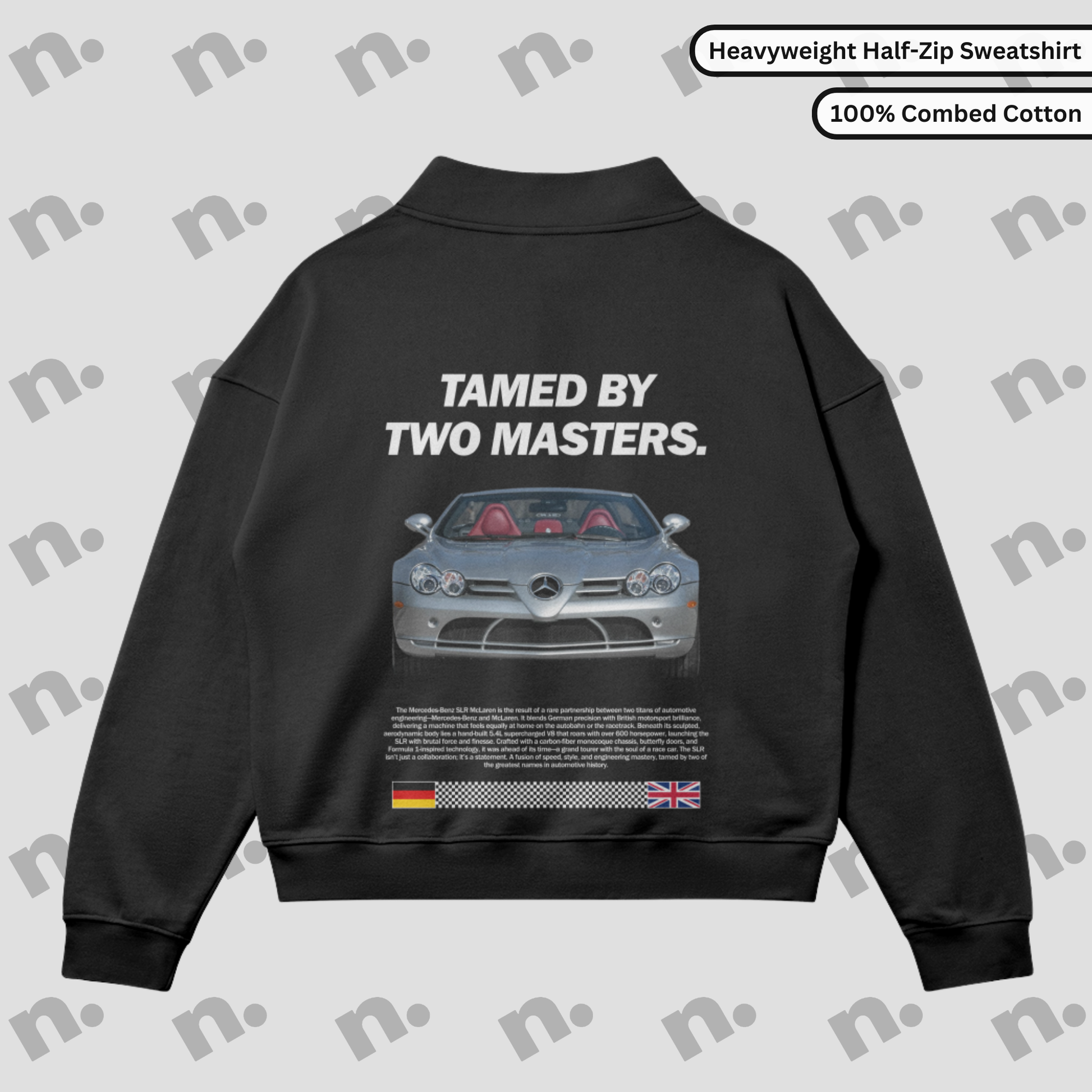 Flat lay of half-zip fleece-lined sweatshirt with bold automotive-inspired “TAMED BY TWO MASTERS.” graphic, drop shoulders, and stand collar in an oversized fit.

