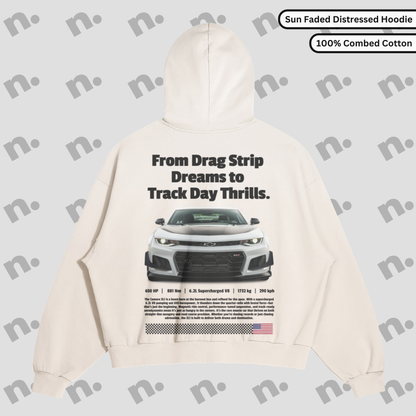 Flat lay of heavyweight hoodie with washed gradient and distressed edges, inspired by vintage speed and garage-worn aesthetics.