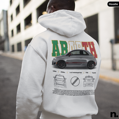 Person wearing a hoodie with a car design and text on the back, standing outdoors. Abarth 500 Poster Style Unisex Hoodie. white