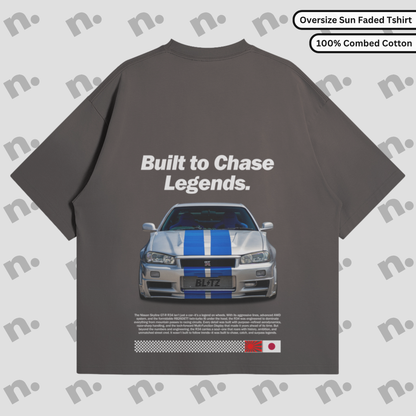 Oversized washed tee with R34-inspired back graphic and boxy fit, in vintage streetwear style.