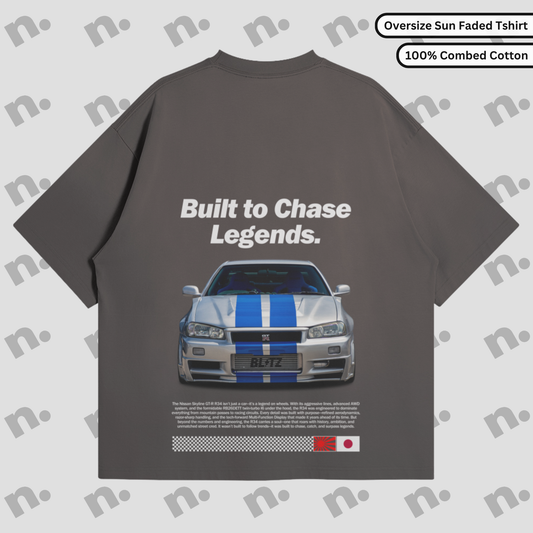 Oversized washed tee with R34-inspired back graphic and boxy fit, in vintage streetwear style.