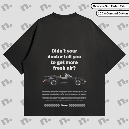 Premium oversized t-shirt inspired by the classic Porsche 911 Cabriolet, featuring a sleek automotive-themed design, perfect for car enthusiasts.