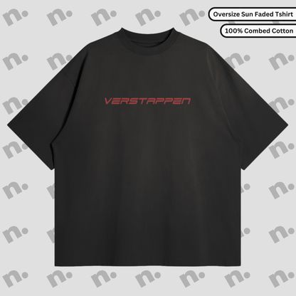 Flat lay of an oversized T-shirt featuring a bold Max Verstappen inspired design, styled with racing lifestyle accessories and a clean, neutral background.