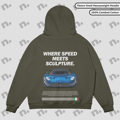 Flat lay of heavyweight fleece-lined hoodie in grayscale tones with a minimalist automotive-inspired design, featuring an oversized fit and kangaroo pocket.

