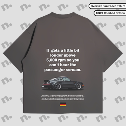 Flat lay of 964 "Louder Above 5000 RPM" oversized T-shirt in washed gradient cotton, featuring drop shoulders and bold car enthusiast design.