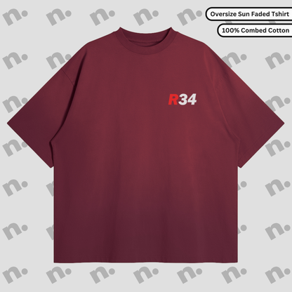 Oversized washed tee with R34-inspired back graphic and boxy fit, in vintage streetwear style.
