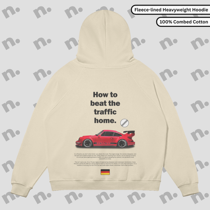 Flat lay of the 911 RWB Autobahn Sun Faded Hoodie with an RWB Porsche graphic and 'How to Beat the Traffic Home' slogan.