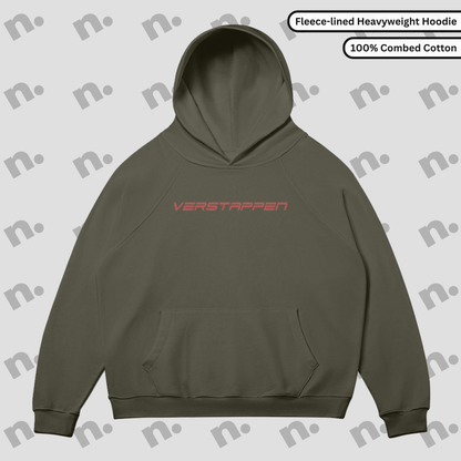 Flat lay of a premium hoodie featuring a bold Max Verstappen inspired design, styled with motorsport-themed accessories on a clean, neutral background.