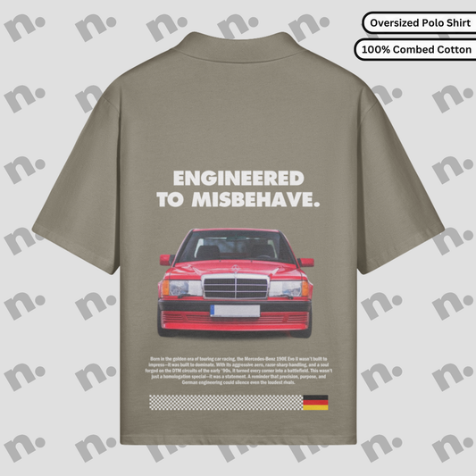 Flat lay of an oversized polo shirt featuring a subtle 190E Evo II inspired design, styled with motorsport and streetwear accessories on a neutral background.
