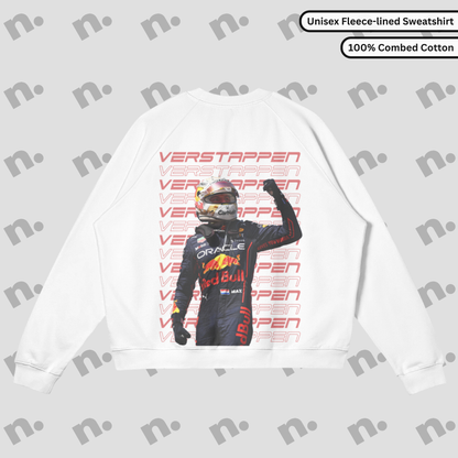 Flat lay of a premium sweatshirt featuring a bold Max Verstappen inspired design, paired with racing lifestyle accessories on a clean, neutral backdrop.