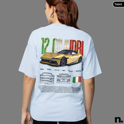 Person wearing a light blue t-shirt with a car design of 12 Cilindri on a gray background.