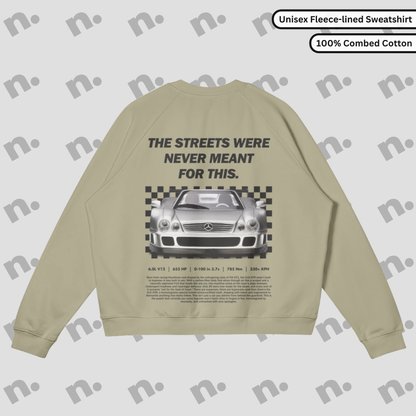 Heavyweight earth-toned fleece pullover with raglan sleeves and relaxed fit inspired by motorsport design.