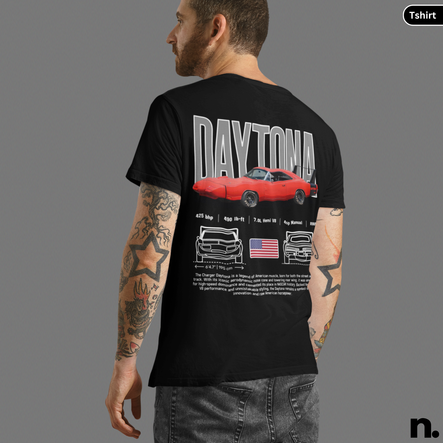Person wearing a black t-shirt with 'Daytona' design on the back, featuring a red car and American flag.