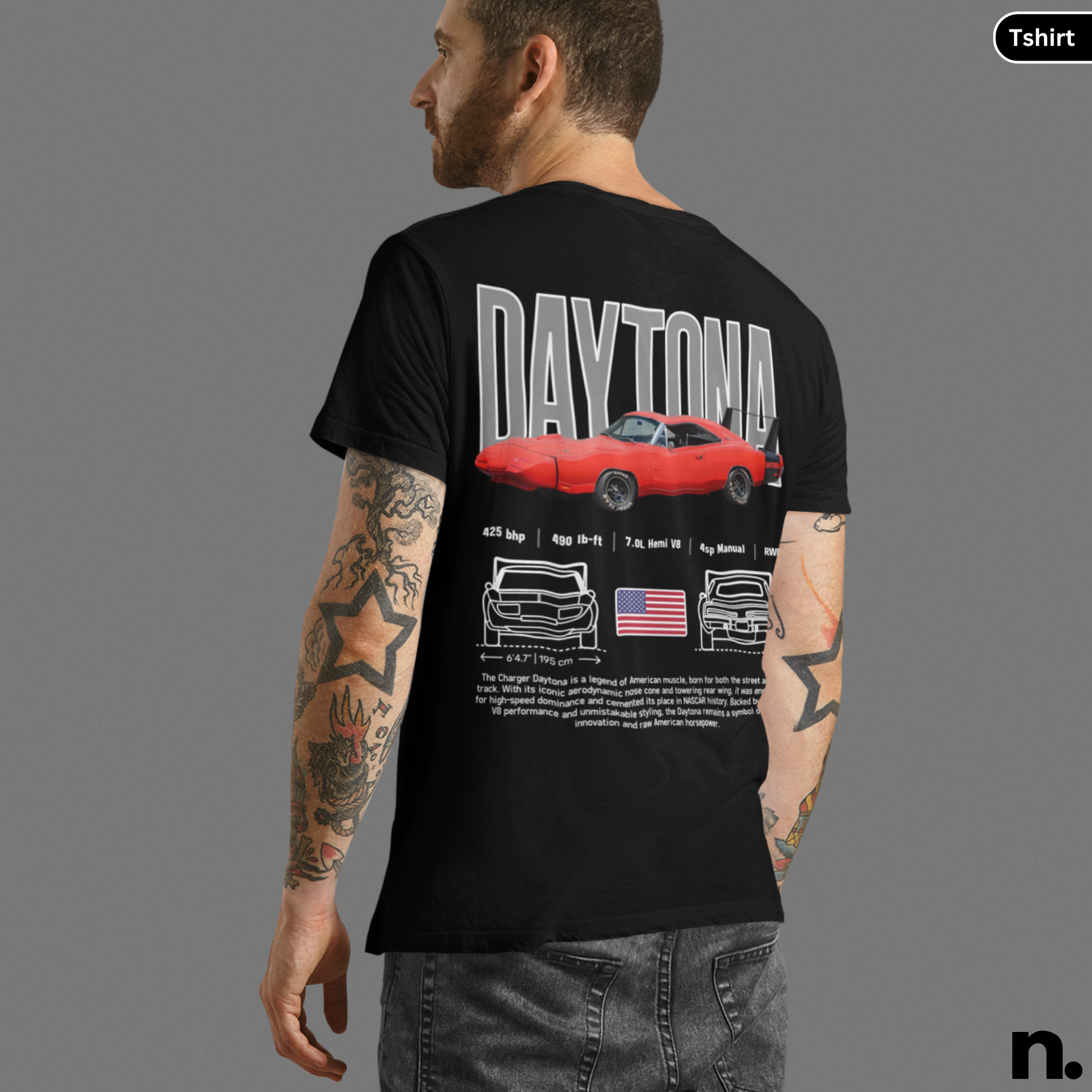 Person wearing a black t-shirt with 'Daytona' design on the back, featuring a red car and American flag.