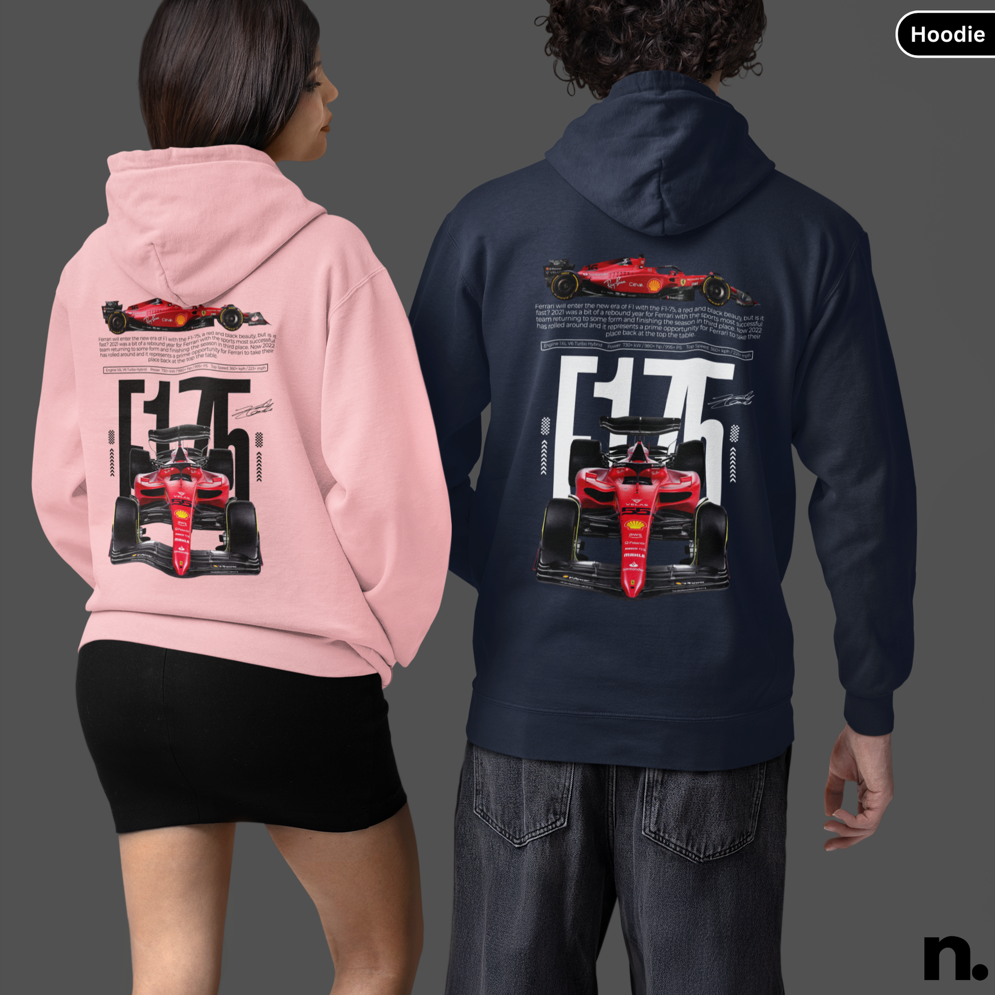 Two people wearing pink and navy hoodies with a race car design on the back.