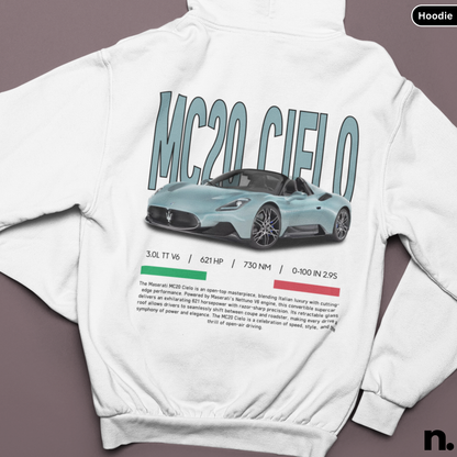 White hoodie with MC20 Cielo design on a brown background