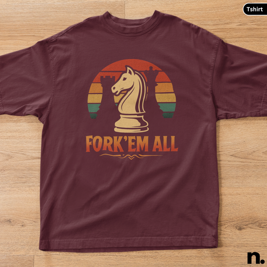 Maroon t-shirt with a chess piece graphic and 'Fork'em All' text on a wooden surface
