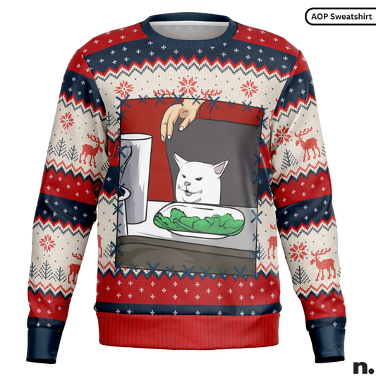 Sweater with a graphic of a meme cat set against a festive pattern.