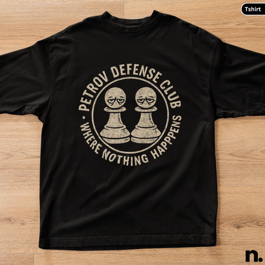 Black t-shirt with 'Petrov Defense Club' graphic on a wooden surface