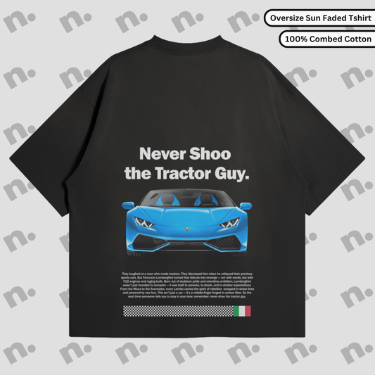 Vintage sun-faded tee featuring the “Never Shoo The Tractor Guy” design — a nod to Lamborghini’s rebellious origin story