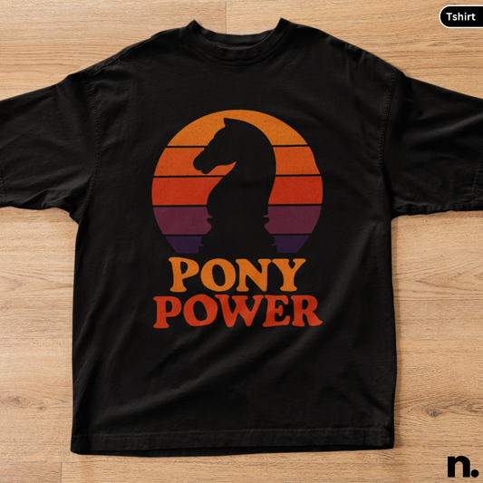 Black t-shirt with 'Pony Power' graphic on a wooden surface