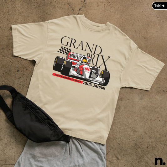 flat lay mockup of grand prix japan tshirt in sand
