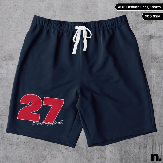 Flat lay of racing-inspired fashion long shorts featuring bold number 27 and motorsport livery design on a clean background