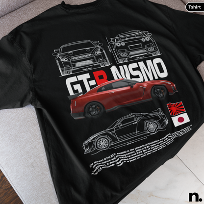 Black t-shirt with red car design and 'GT-R NISMO' text on a gray surface.