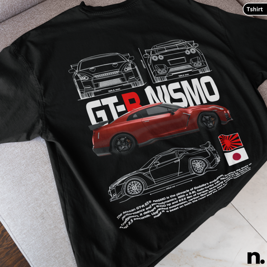 Black t-shirt with red car design and 'GT-R NISMO' text on a gray surface.