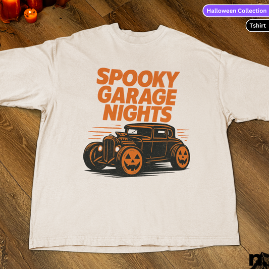 White t-shirt with 'Spooky Garage Nights' graphic on a wooden surface