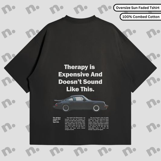 Flat lay of the 911 Therapy Sun Faded T-shirt featuring a classic 911 graphic and 'Therapy is Expensive' slogan.