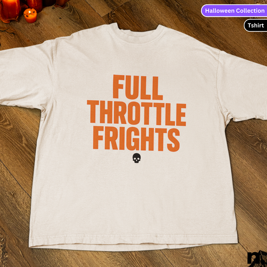 White t-shirt with 'FULL THROTTLE FRIGHTS' text in orange on a wooden surface.