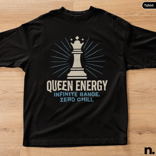Black t-shirt with a chess piece design and text on a wooden surface