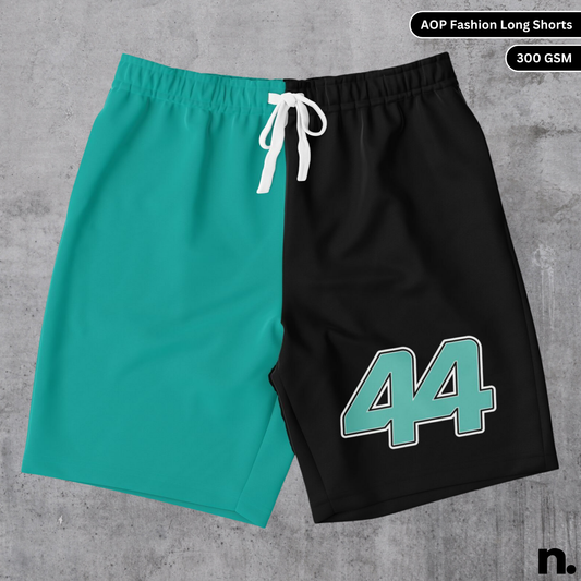 Flat lay of Hamilton-inspired fashion long shorts with F1 racing details and bold graphic design