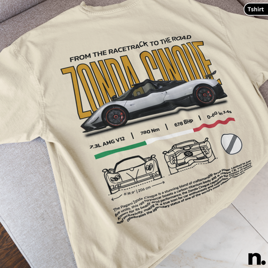 Beige t-shirt with Zonda design on a gray surface